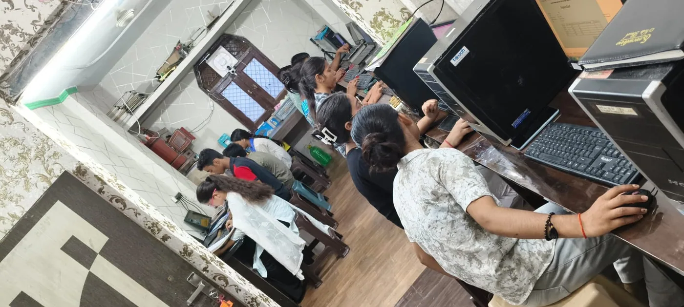 MICE students practising computer applications in the classroom